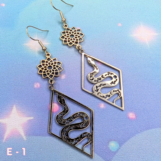 Silver Lotus Star Earrings with Snakes and Geometric Diamond Frame