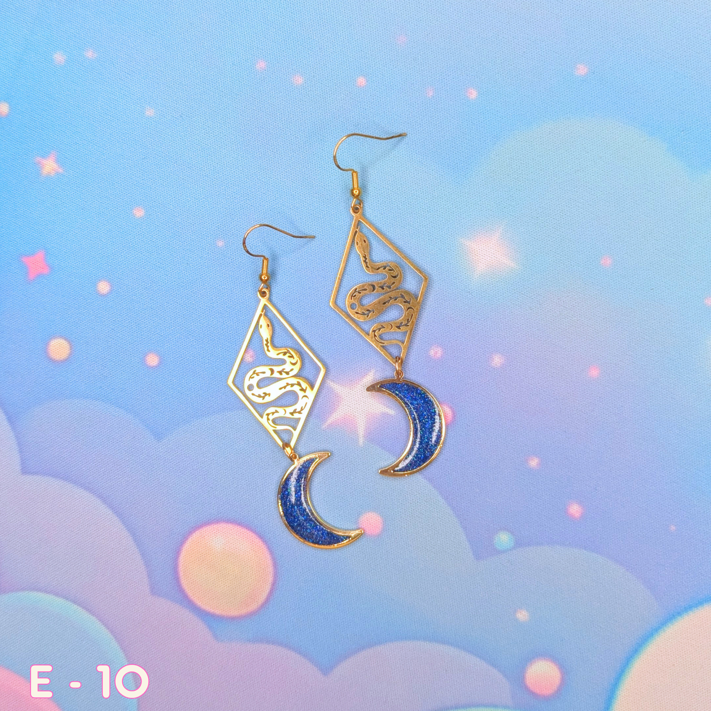 Gold Earrings with Blue Sparkly Resin Moons and Geometric Diamond Snakes